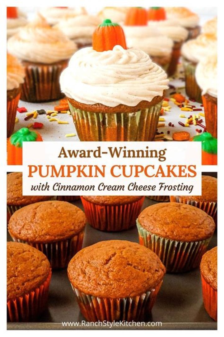 Pumpkin cupcake on a wire rack topped with white frosting and caramel.